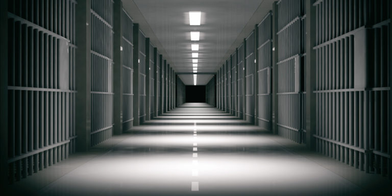 Prison,Interior.,Jail,Cells,And,Shadows,,Dark,Background